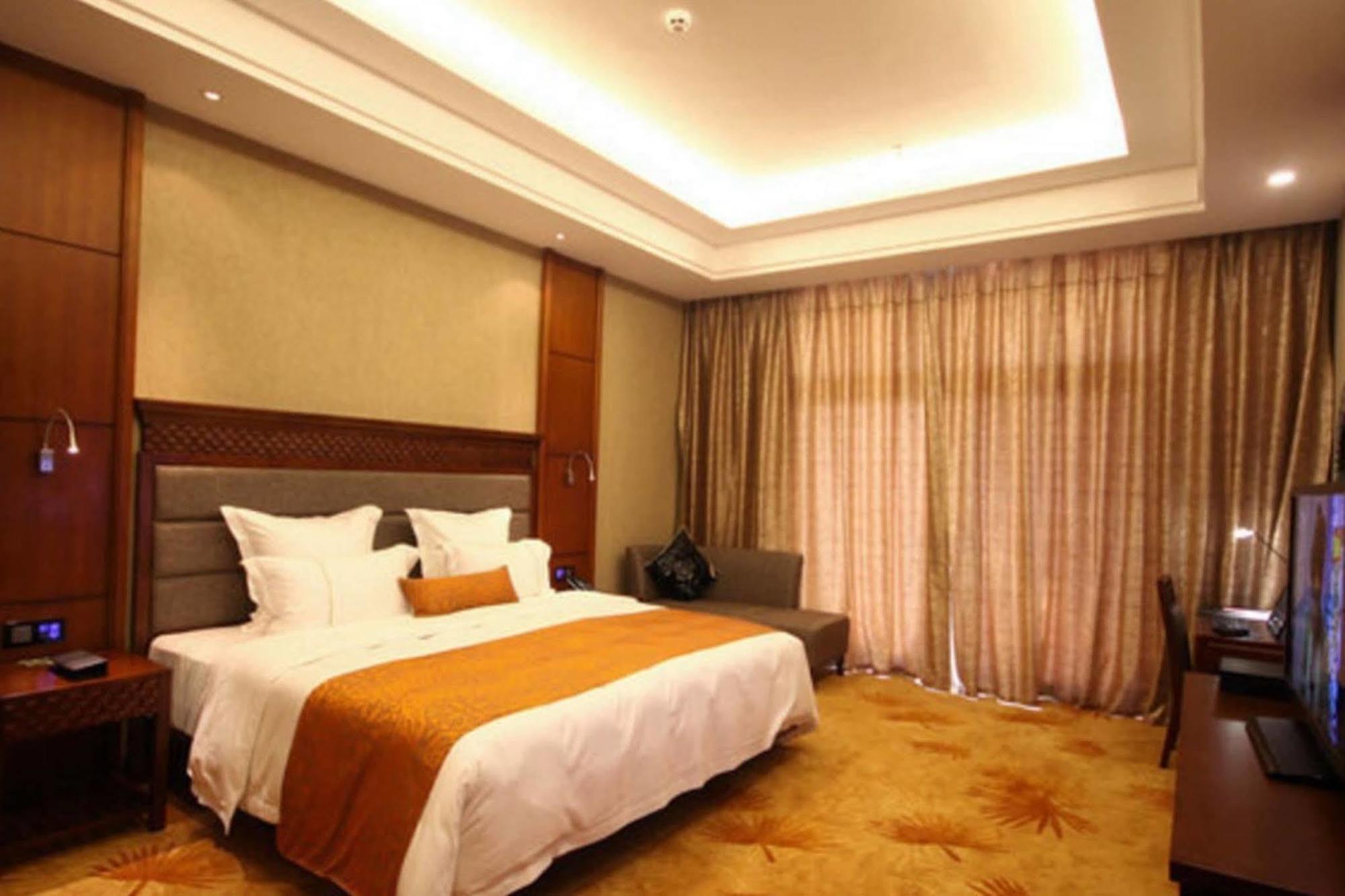 Hotel Ramada Plaza Xishuangbanna Exterior foto